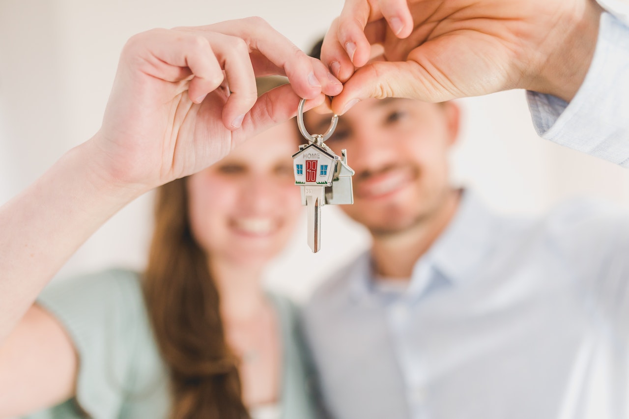 homeowners holding house key